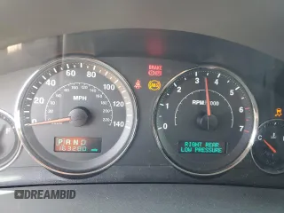 2005 Jeep Grand Cherokee Limited with VIN 1J8HR58265C699077, listed as a Copart auction lot 58490185 with 163,280 mi miles and Salvage title. Bid and sale history available at DreamBid. Image 9.