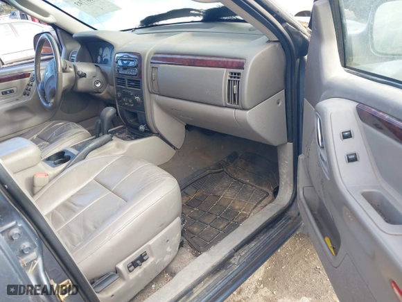 2003 Jeep Grand Cherokee Limited with VIN 1J8GW58S93C589285, listed as a IAAI auction lot 41467743 with 231,614 mi miles. Bid and sale history available at carsss.com. Image 5.