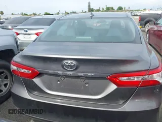 2019 Toyota Camry LE with VIN 4T1B11HK4KU254853, listed as a IAAI auction lot 42013255 with 153,664 mi miles and . Bid and sale history available at DreamBid. Image 16.