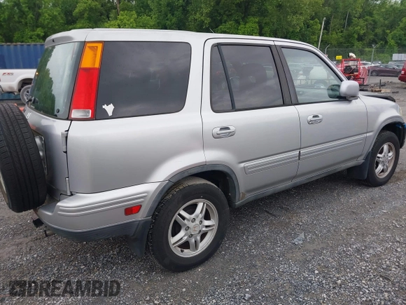 2001 Honda CR-V SE z VIN JHLRD18771C002009, wystawiony jako IAAI lot #42368432 z przebiegiem 257 664 mil mil oraz . Historia ofert i sprzedaży dostępna na DreamBid. Obrazek 4.