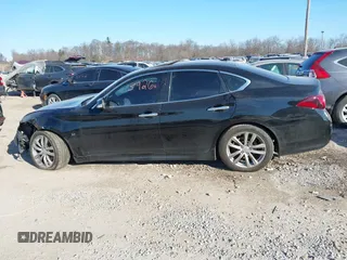 2015 Infiniti Q70 with VIN JN1BY1AR6FM560209, listed as a IAAI auction lot 41703926 with 117,503 mi miles and . Bid and sale history available at DreamBid. Image 14.