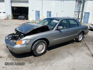 2001 Mercury Grand Marquis LS with VIN 2MEFM75W31X612800, listed as a Copart auction lot 50886005 with 58,400 mi miles and Salvage Title. Bid and sale history available at DreamBid. Image 1.