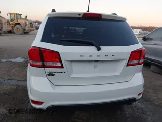 2018 Dodge Journey SXT with VIN 3C4PDCBG4JT514453, listed as a IAAI auction lot 41406727 with 121,235 mi miles. Bid and sale history available at carsss.com. Image 16.