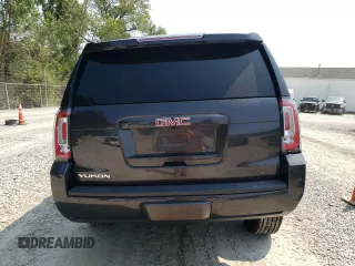 2016 GMC Yukon SLT with VIN 1GKS2BKC4GR104863, listed as a Copart auction lot 70062604 with 118,377 mi miles and Salvage Title. Bid and sale history available at carsss.com. Image 6.