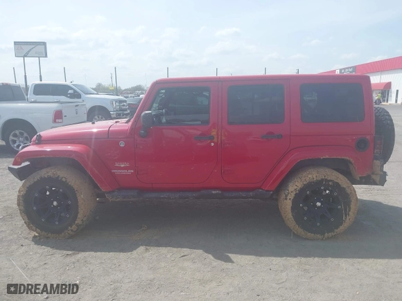 2012 Jeep Wrangler Unlimited Sahara with VIN 1C4HJWEGXCL209449, listed as a IAAI auction lot 41864432 with 100,917 mi miles. Bid and sale history available at carsss.com. Image 14.