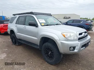 2006 Toyota 4Runner SR5 z VIN JTEBU14R060084935, wystawiony jako IAAI lot #41885709 z przebiegiem 206 251 mil mil oraz . Historia ofert i sprzedaży dostępna na DreamBid. Obrazek 1.