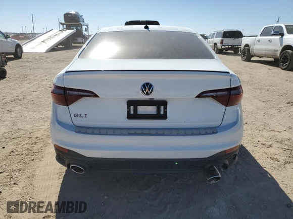 2024 Volkswagen Jetta 40th Anniversary Edition with VIN 3VW8T7BU0RM068373, listed as a Copart auction lot 77764614 with 12,128 mi miles and Salvage title. Bid and sale history available at DreamBid. Image 6.
