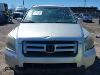 2007 Honda Pilot EX-L with VIN 2HKYF18597H514837, listed as a IAAI auction lot 41800365 with 194,341 mi miles. Bid and sale history available at carsss.com. Image 12.