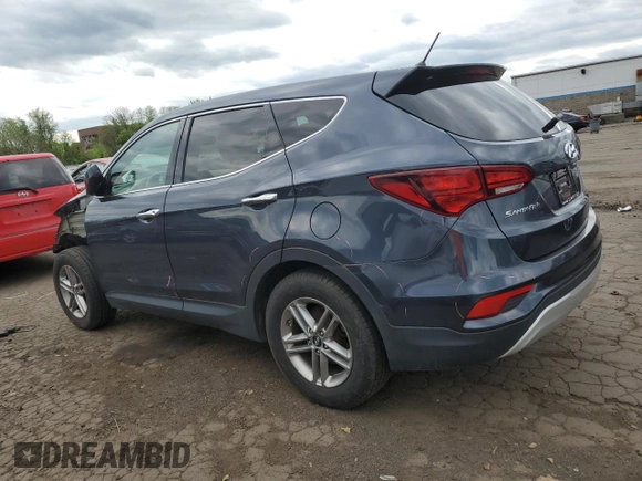 2018 Hyundai Santa Fe 2.4L z VIN 5NMZTDLB4JH066703, wystawiony jako Copart lot #54432155 z przebiegiem 67 737 mil mil oraz Szkoda całkowita • Salvage title. Historia ofert i sprzedaży dostępna na DreamBid. Obrazek 2.
