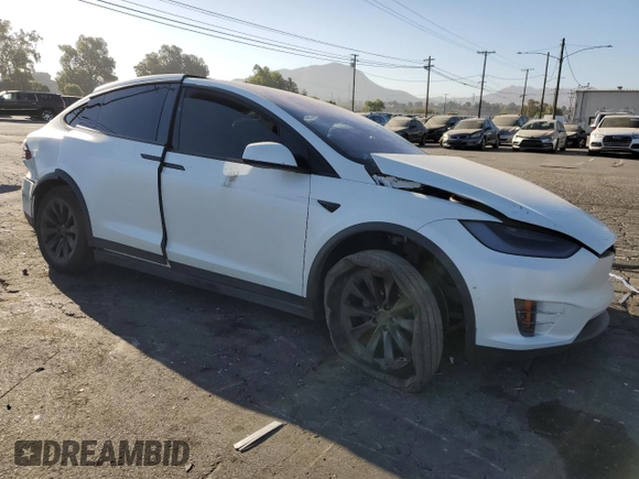 2021 Tesla Model X Long Range Plus with VIN 5YJXCBE22MF311576, listed as a Copart auction lot 68583984 with 83,137 mi miles and Salvage Title. Bid and sale history available at carsss.com. Image 4.