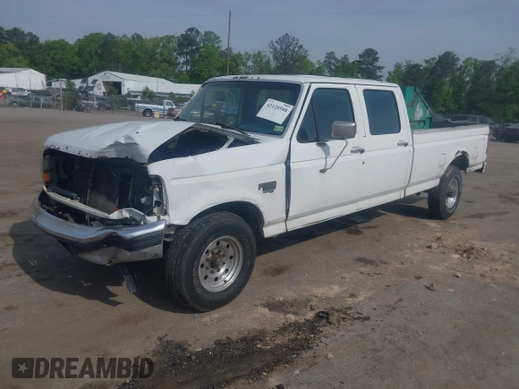 1996 Ford F-350 with VIN 1FTJW35F8TEA09134, listed as a IAAI auction lot 42120588 with 363,876 mi miles and . Bid and sale history available at DreamBid. Image 2.