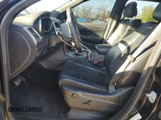 2018 Jeep Grand Cherokee Altitude with VIN 1C4RJFAGXJC296051, listed as a Copart auction lot 53450135 with 65,838 mi miles and Salvage title. Bid and sale history available at DreamBid. Image 7.