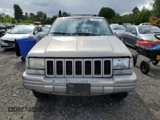 1998 Jeep Grand Cherokee Limited с VIN 1J4GZ78Y0WC245194, выставлен на аукционе Copart как лот 57838825 с пробегом 199 412 миль миль и Списание • Salvage title. История ставок и продаж доступна на DreamBid. Изображение 5.