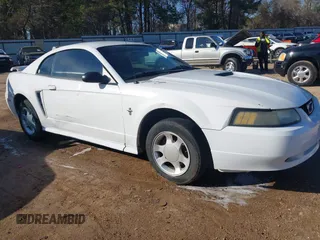 2001 Ford Mustang Standard with VIN 1FAFP40411F243241, listed as a IAAI auction lot 41281653 with 238,524 mi miles. Bid and sale history available at carsss.com. Image 1.