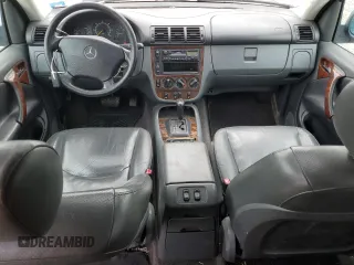 1999 Mercedes-Benz M 320/430/500 with VIN 4JGAB54E9XA127797, listed as a Copart auction lot 51408235 with 243,566 mi miles and Salvage title. Bid and sale history available at DreamBid. Image 8.