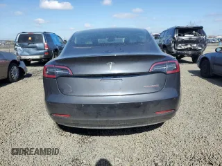 2018 Tesla Model 3 Long Range Battery with VIN 5YJ3E1EBXJF103797, listed as a Copart auction lot 47920715 with Not Provided miles and Salvage Title. Bid and sale history available at DreamBid. Image 6.