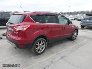 2015 Ford Escape Titanium with VIN 1FMCU0JX2FUA04643, listed as a IAAI auction lot 41019925 with 79,989 mi miles. Bid and sale history available at carsss.com. Image 4.