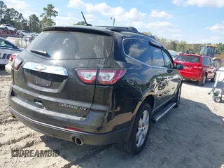 2016 Chevrolet Traverse LTZ with VIN 1GNKVJKD1GJ221893, listed as a IAAI auction lot 41913000 with 112,900 mi miles and . Bid and sale history available at DreamBid. Image 4.