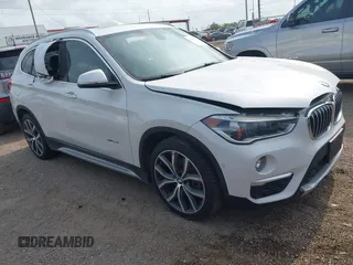 2016 BMW X1 xDrive28i z VIN WBXHT3C39GP881934, wystawiony jako IAAI lot #42105742 z przebiegiem 119 496 mil mil oraz . Historia ofert i sprzedaży dostępna na DreamBid. Obrazek 1.