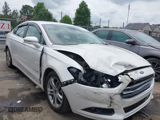2016 Ford Fusion Titanium Hybrid with VIN 3FA6P0RU3GR190355, listed as a IAAI auction lot 42384309 with 157,172 mi miles and . Bid and sale history available at DreamBid. Image 1.