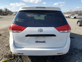 2014 Toyota Sienna L с VIN 5TDZK3DC5ES451825, выставлен на аукционе Copart как лот 79619074 с пробегом 151 146 миль миль и Списание • Salvage title. История ставок и продаж доступна на DreamBid. Изображение 6.