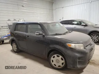 2012 Scion xB with VIN JTLZE4FE4CJ016000, listed as a Copart auction lot 81635184 with 137,019 mi miles and Clean Title. Bid and sale history available at carsss.com. Image 4.