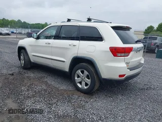 2011 Jeep Grand Cherokee Laredo with VIN 1J4RR4GG6BC680943, listed as a IAAI auction lot 42419575 with 188,672 mi miles and . Bid and sale history available at DreamBid. Image 3.