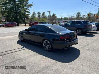 2018 Audi S6 Premium Plus z VIN WAUFFAFC6JN000859, wystawiony jako Copart lot #58193725 z przebiegiem 120 327 mil mil oraz Tytuł czysty. Historia ofert i sprzedaży dostępna na DreamBid. Obrazek 3.