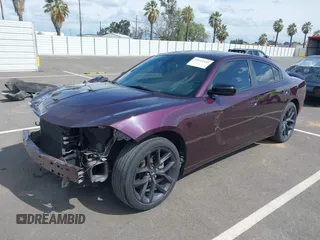 2022 Dodge Charger SXT with VIN 2C3CDXBG4NH208748, listed as a IAAI auction lot 41916434 with 54,053 mi miles and . Bid and sale history available at DreamBid. Image 18.