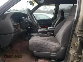 1996 Jeep Grand Cherokee Laredo with VIN 1J4FX58S5TC248122, listed as a Copart auction lot 45843935 with 295,521 mi miles and Salvage Title. Bid and sale history available at carsss.com. Image 7.