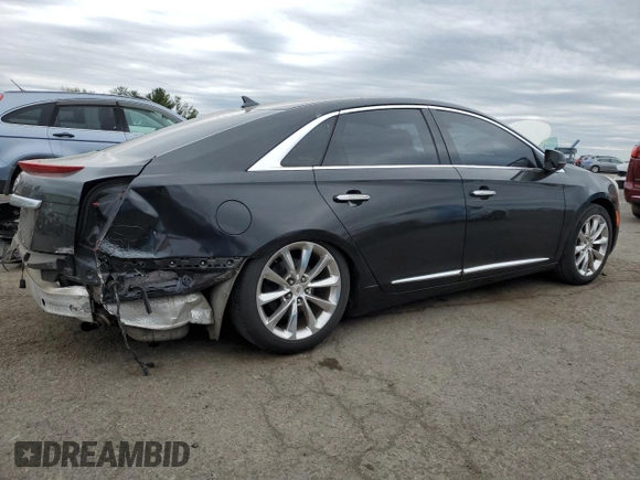 2013 Cadillac XTS Luxury z VIN 2G61R5S37D9127597, wystawiony jako Copart lot #53841755 z przebiegiem 81 603 mil mil oraz Szkoda całkowita • Salvage title. Historia ofert i sprzedaży dostępna na DreamBid. Obrazek 3.