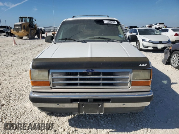 1994 Ford Explorer Eddie Bauer z VIN 1FMDU32X4RUD96419, wystawiony jako Copart lot #77066224 z przebiegiem 179 299 mil mil oraz Tytuł czysty. Historia ofert i sprzedaży dostępna na DreamBid. Obrazek 5.