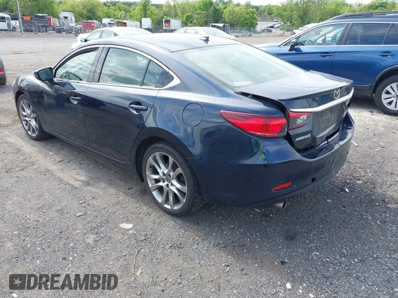2015 Mazda 6 i Grand Touring with VIN JM1GJ1W53F1200121, listed as a IAAI auction lot 42173036 with 76,184 mi miles and . Bid and sale history available at DreamBid. Image 3.