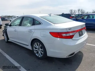 2013 Hyundai Azera with VIN KMHFG4JG7DA247682, listed as a IAAI auction lot 41843611 with 63,009 mi miles. Bid and sale history available at carsss.com. Image 3.