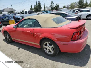 2002 Ford Mustang Deluxe z VIN 1FAFP44472F107630, wystawiony jako Copart lot #56256865 z przebiegiem 214 457 mil mil oraz Szkoda całkowita • Salvage title. Historia ofert i sprzedaży dostępna na DreamBid. Obrazek 2.