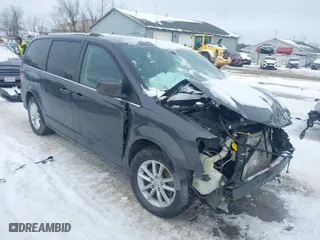 2018 Dodge Grand Caravan SXT with VIN 2C4RDGCG2JR325737, listed as a IAAI auction lot 41610173 with 97,492 mi miles. Bid and sale history available at carsss.com. Image 1.