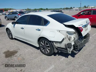 2016 Nissan Altima SV with VIN 1N4AL3AP9GC135114, listed as a IAAI auction lot 41851507 with 127,033 mi miles and . Bid and sale history available at DreamBid. Image 3.