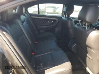 2015 Ford Taurus SEL with VIN 1FAHP2E8XFG209390, listed as a Copart auction lot 58992305 with 99,498 mi miles and Salvage title. Bid and sale history available at DreamBid. Image 10.