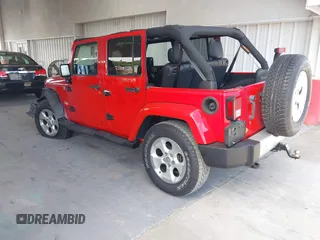 2014 Jeep Wrangler Unlimited Sahara z VIN 1C4BJWEGXEL179054, wystawiony jako IAAI lot #42151597 z przebiegiem 151 810 mil mil oraz . Historia ofert i sprzedaży dostępna na DreamBid. Obrazek 3.