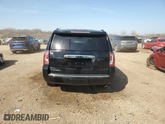 2016 GMC Yukon Denali with VIN 1GKS2CKJ9GR301628, listed as a Copart auction lot 48937035 with 121,863 mi miles and Salvage Title. Bid and sale history available at carsss.com. Image 6.