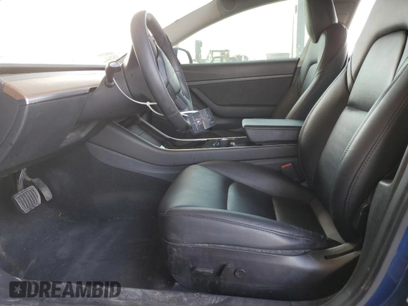 2020 Tesla Model 3 Standard Range Plus with VIN 5YJ3E1EA7LF705907, listed as a Copart auction lot 48765145 with 104,479 mi miles and Salvage Title. Bid and sale history available at DreamBid. Image 7.