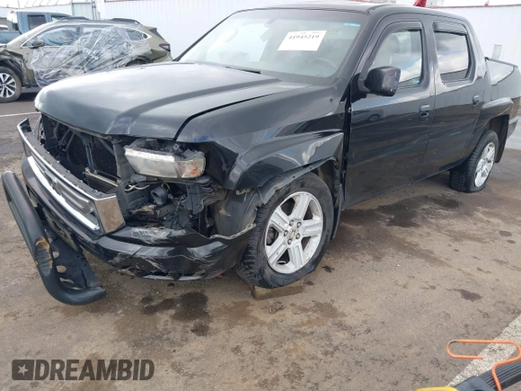 2011 Honda Ridgeline RTL with VIN 5FPYK1F53BB001385, listed as a IAAI auction lot 41945219 with 168,713 mi miles and . Bid and sale history available at DreamBid. Image 6.