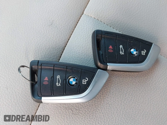 2021 BMW X1 xDrive28i with VIN WBXJG9C02M3M42379, listed as a IAAI auction lot 42476221 with 60,412 mi miles and . Bid and sale history available at DreamBid. Image 11.