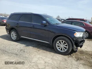 2014 Dodge Durango SXT with VIN 1C4RDJAGXEC590226, listed as a Copart auction lot 51309025 with 105,521 mi miles and Non repairable. Bid and sale history available at DreamBid. Image 4.