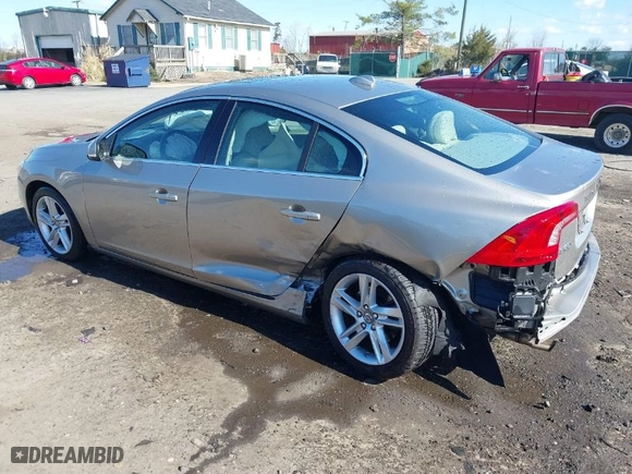 2014 Volvo S60 T5 with VIN YV1612FS8E1297431, listed as a IAAI auction lot 41876534 with 105,483 mi miles. Bid and sale history available at carsss.com. Image 3.