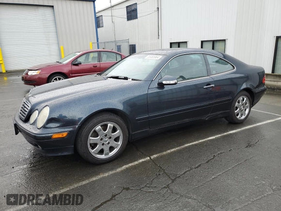 2000 Mercedes-Benz CLK 320/430 with VIN WDBLJ65GXYF158128, listed as a Copart auction lot 85065964 with 244,551 mi miles and Salvage Title. Bid and sale history available at DreamBid. Image 1.