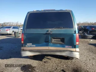 1999 GMC Safari with VIN 1GKEL19W0XB509860, listed as a Copart auction lot 84671294 with 141,872 mi miles and Salvage Title. Bid and sale history available at carsss.com. Image 6.