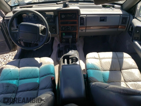 1994 Jeep Grand Cherokee Limited with VIN 1J4GZ78Y0RC190766, listed as a Copart auction lot 54628055 with 217,270 mi miles and Salvage title. Bid and sale history available at DreamBid. Image 8.