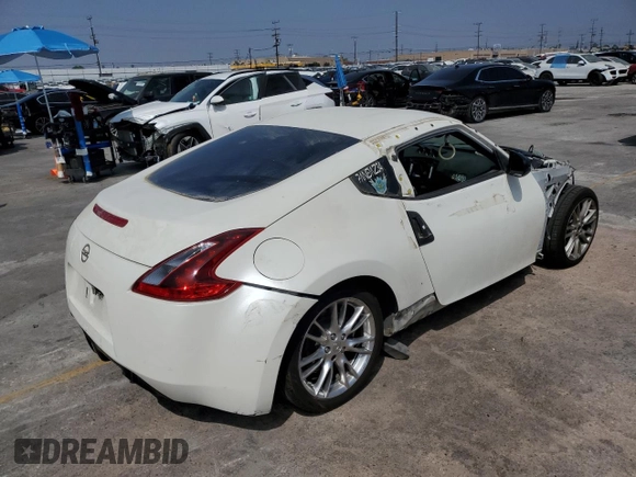 2013 Nissan 370Z with VIN JN1AZ4EH9DM381266, listed as a Copart auction lot 59989515 with 170,900 mi miles and Salvage title. Bid and sale history available at DreamBid. Image 3.