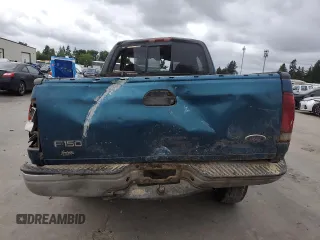 2001 Ford F-150 XL z VIN 1FTRX18W61NA24177, wystawiony jako Copart lot #60149714 z przebiegiem 192 297 mil mil oraz Szkoda całkowita • Salvage title. Historia ofert i sprzedaży dostępna na DreamBid. Obrazek 6.